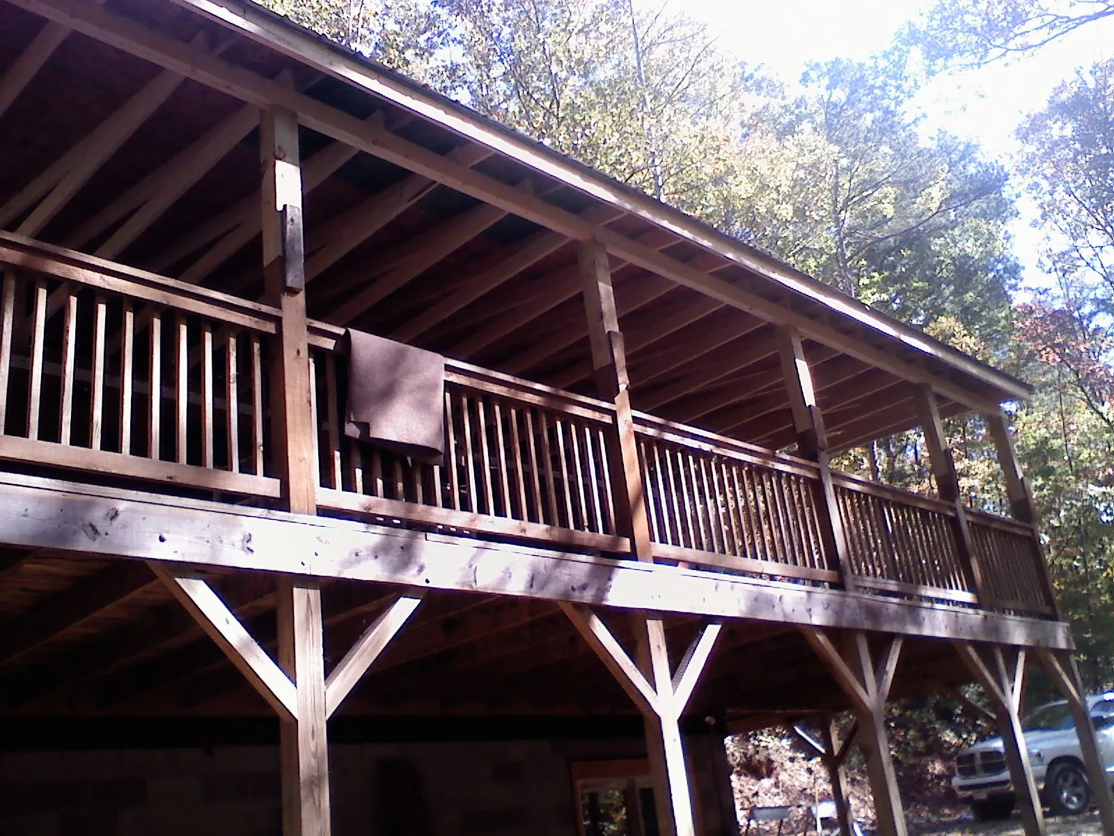 Timber framing under a new elevated porch and deck — Roof Leak Repair in Ridge by Roofing Brothers